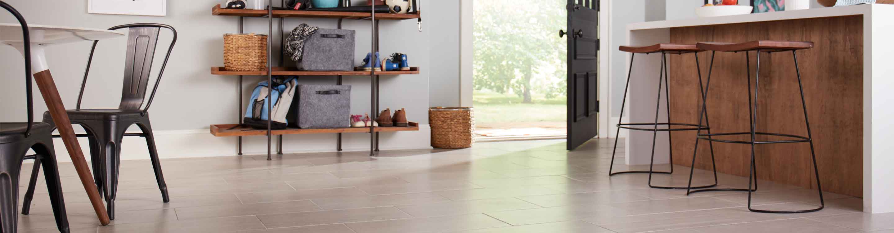 large format oversized tile flooring in kitchen entryway area